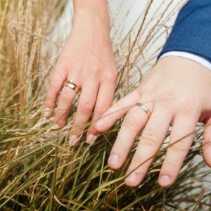 closeup-photo-of-bride-and-groom-hands-touching-grass-on-the-field-weeding-ceremony-in-nature.jpg closeup-photo-of-bride-and-groom-hands-touching-grass-on-the-field-weeding-ceremony-in-nature.jpg
